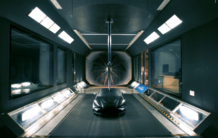 A car on a conveyor belt

Description automatically generated